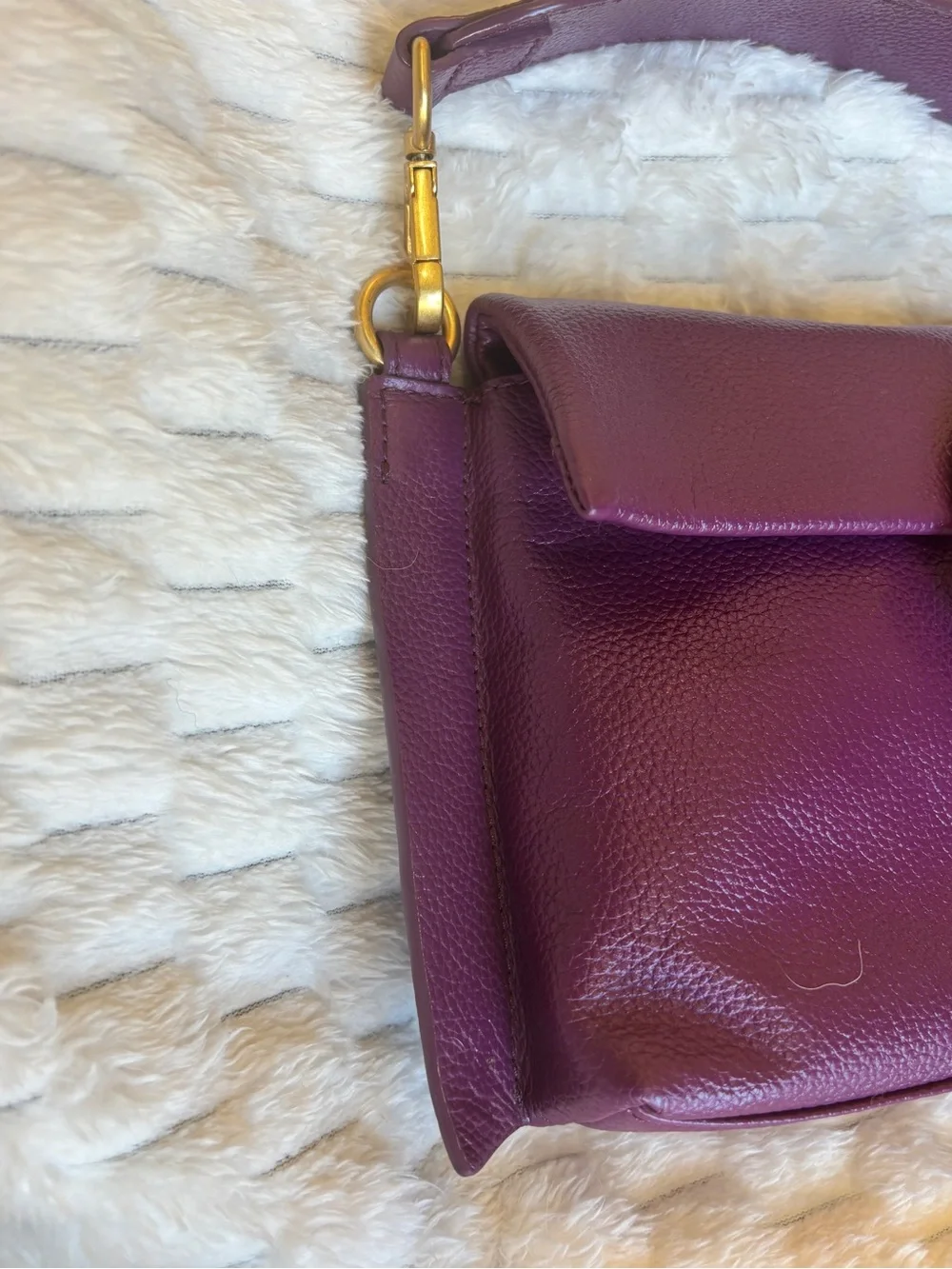 Vince Camuto pebbled purple leather Crossbody bag. Large gold ring hardware.